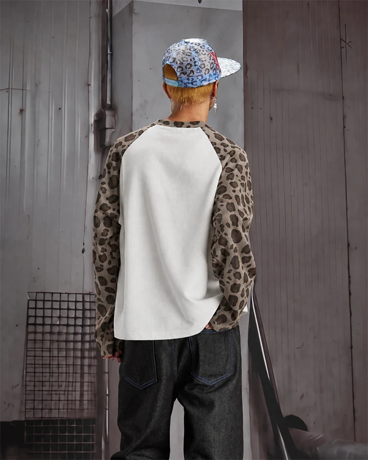 KIIKIO Leopard Sleeve Graphic Raglan Long Sleeve Tee
