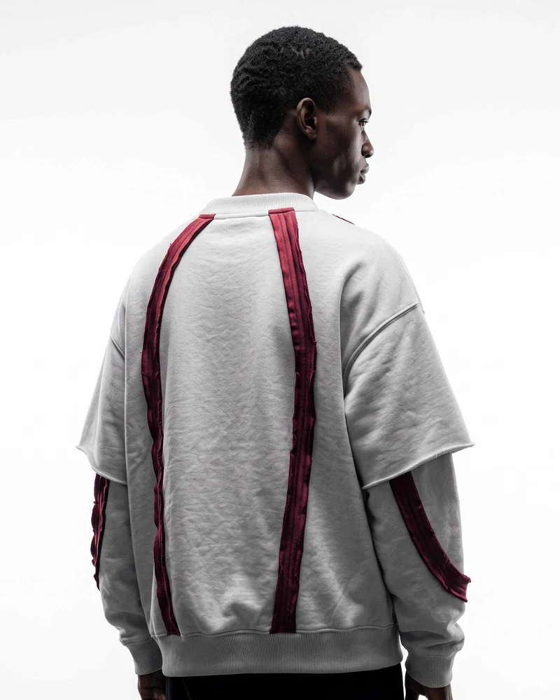KIIKIO SYMBIOTE Layered Raw-Edge Contrast Sweatshirt