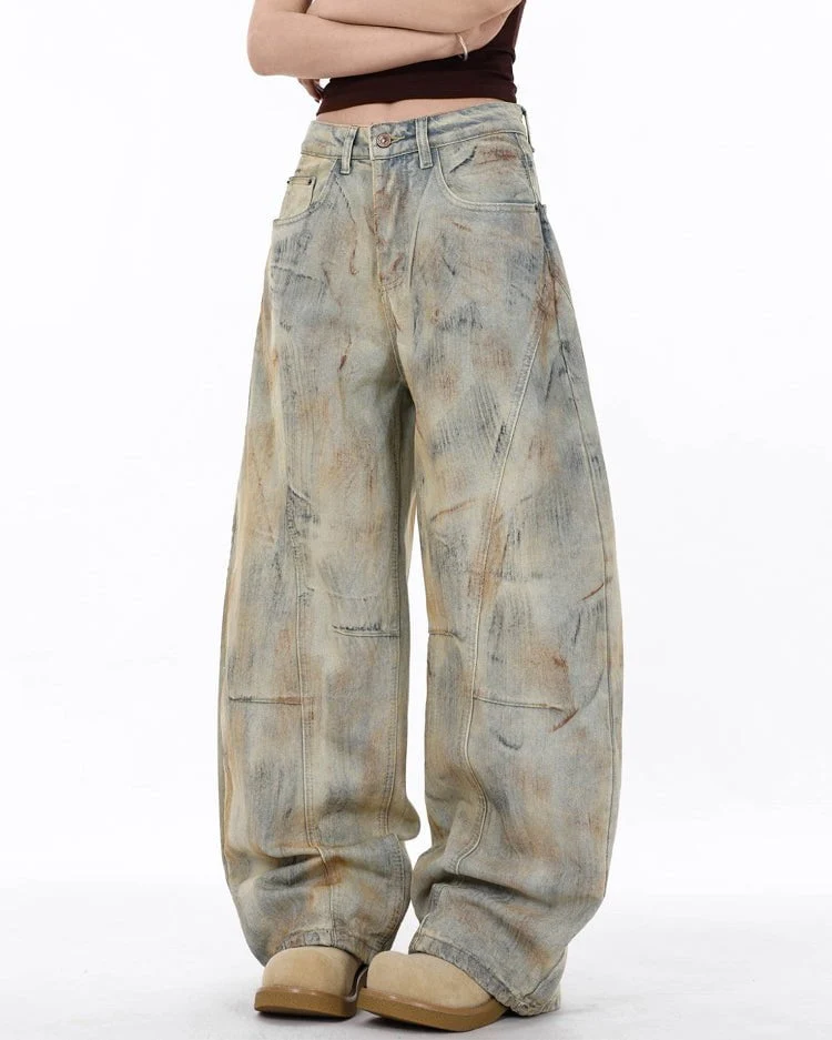 Arc-Cut Distressed Wide-Leg Jeans