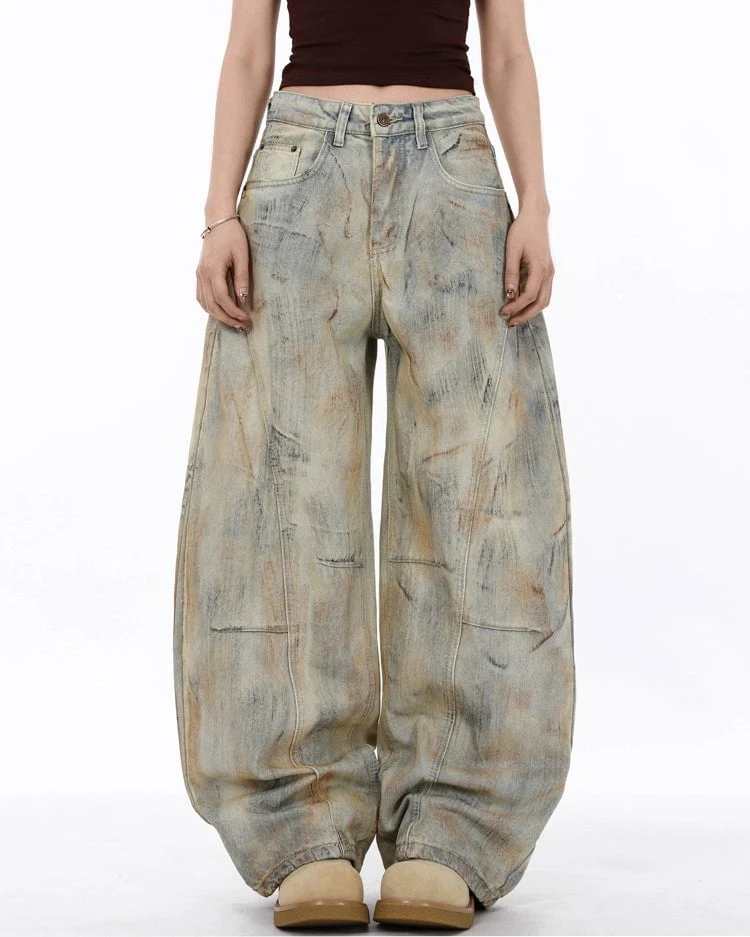 Arc-Cut Distressed Wide-Leg Jeans