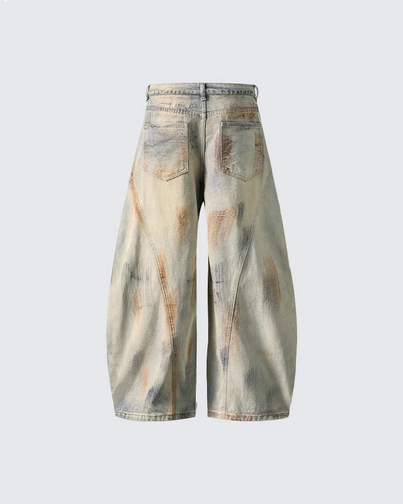 Arc-Cut Distressed Wide-Leg Jeans